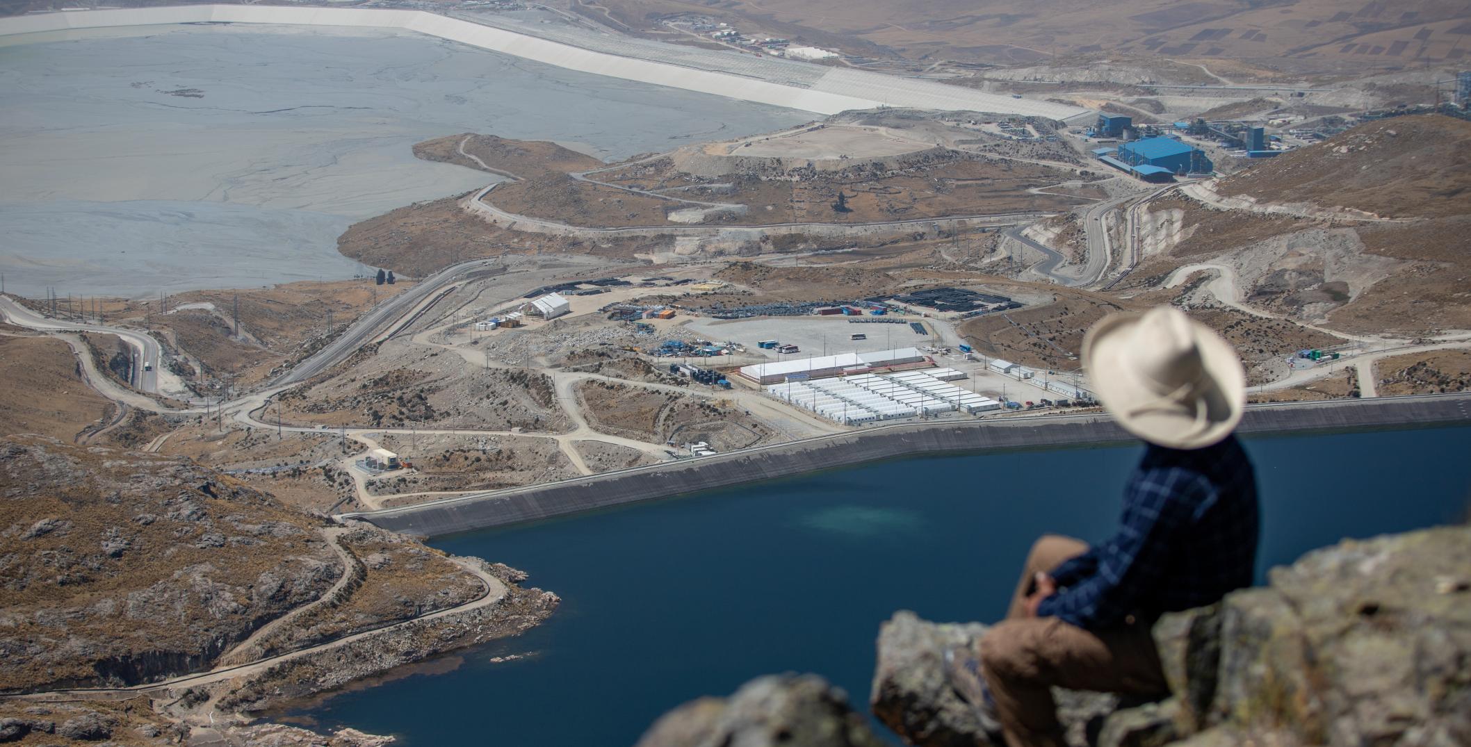Man observing copper mine in Challhuahuacho, Peru 