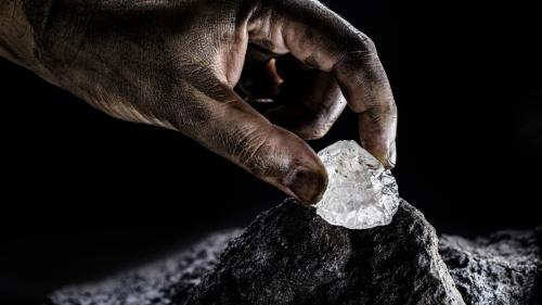 Lithium mining hand